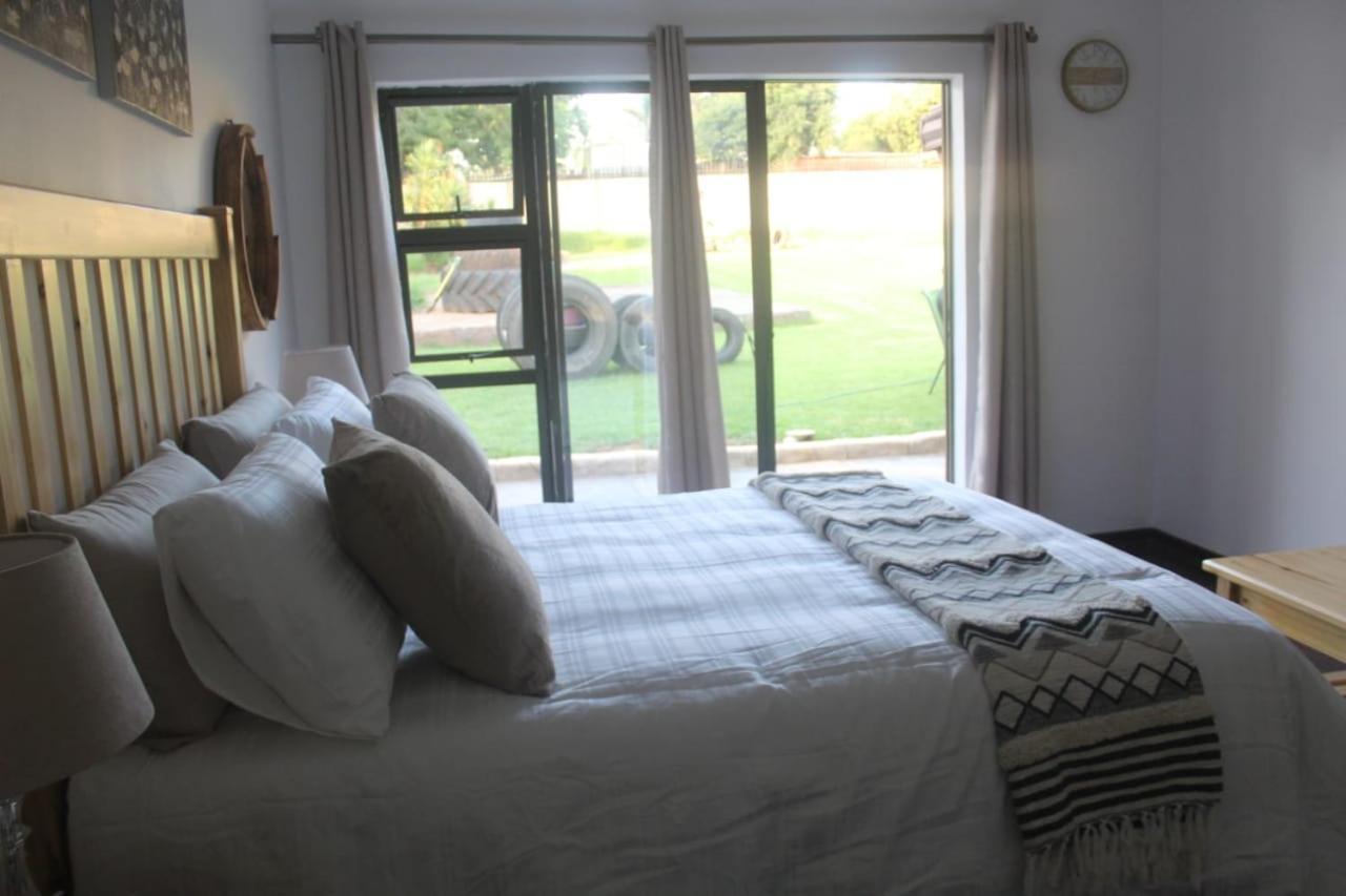 Alu Guesthouse Roodepoort Quarto foto